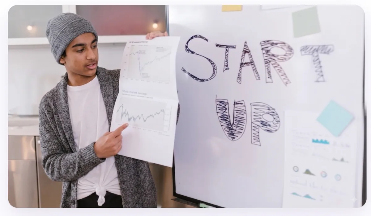 A student presenting their own product at Demo Day